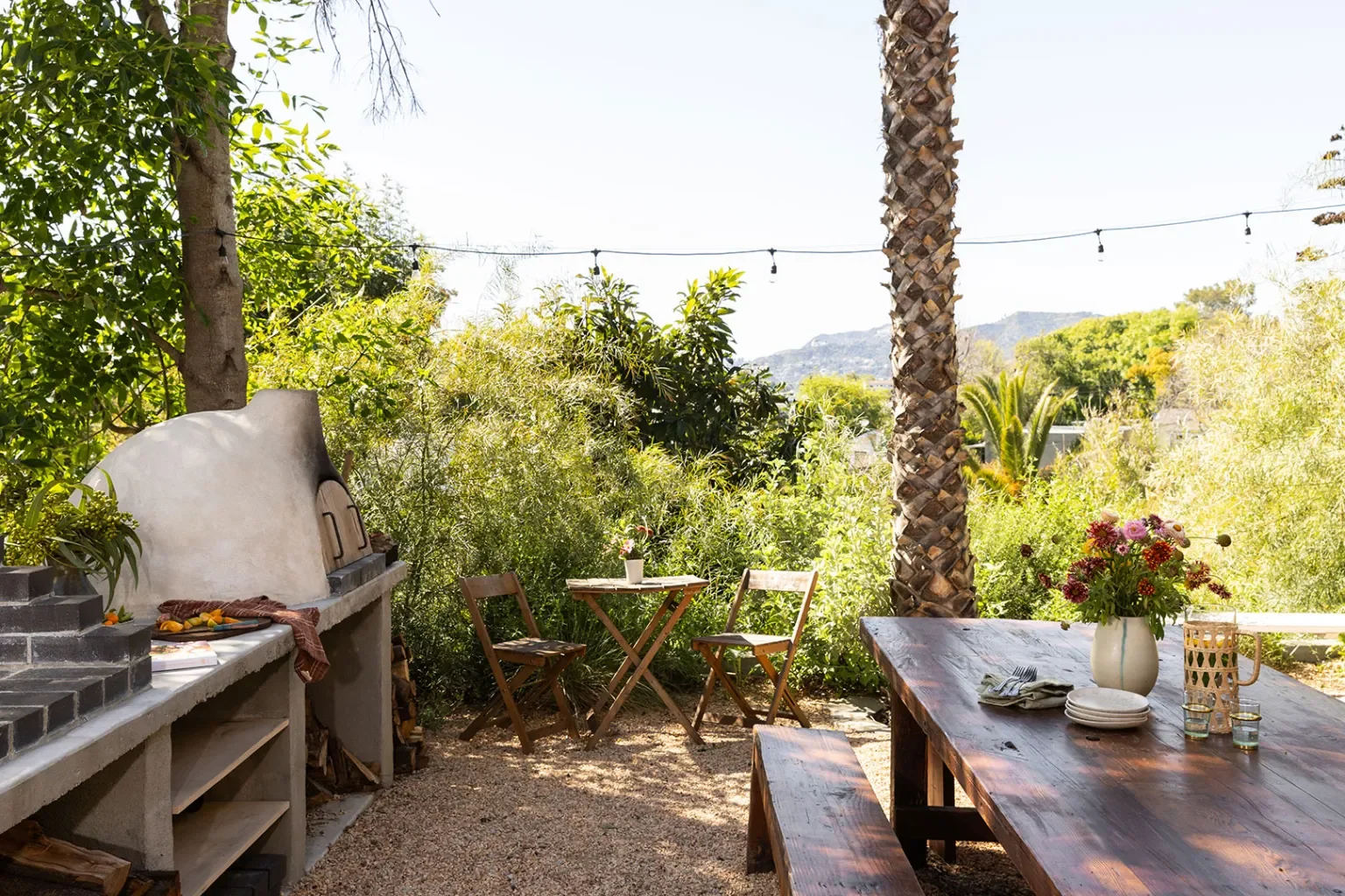 A Handbuilt Outdoor Oven and Wood-Clad Hot Tub Steal the Show in This L.A. Backyard