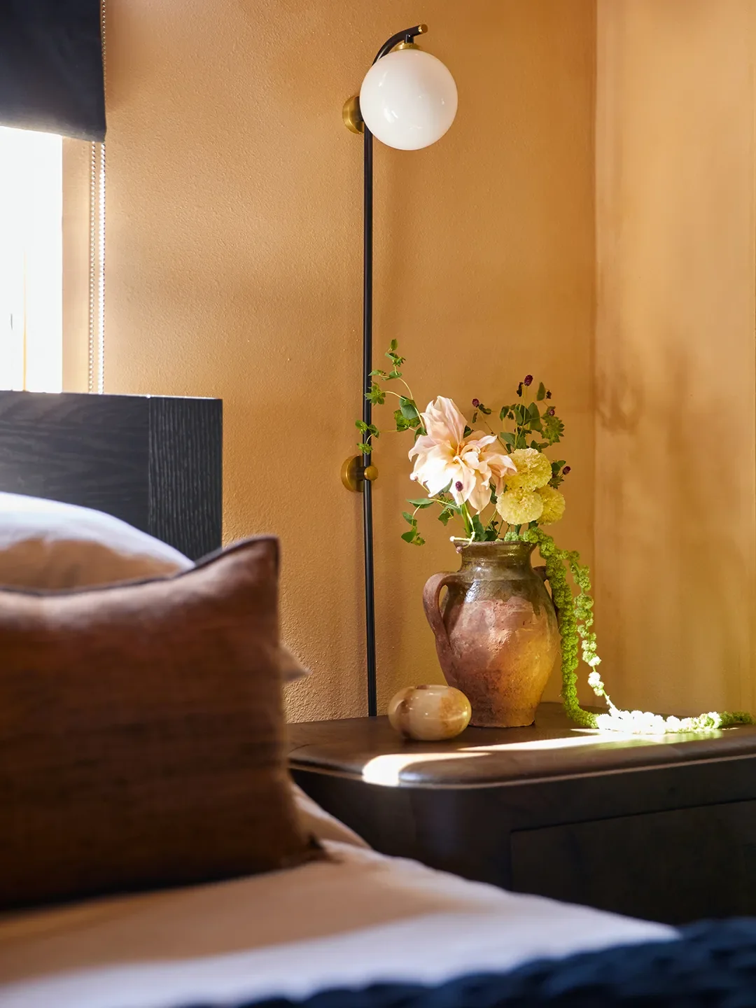 Why Designers Love This Plug-In Sconce: The Cord Simply Disappears