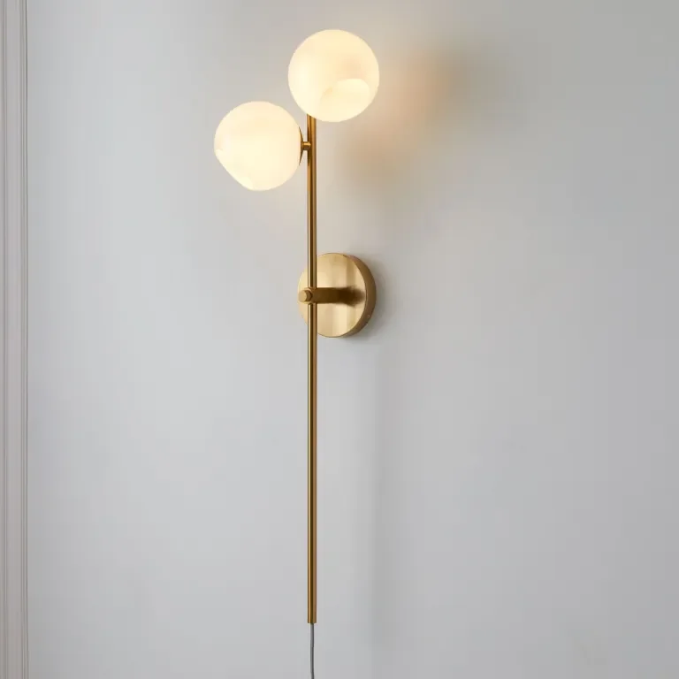 Why Designers Love This Plug-In Sconce: The Cord Simply Disappears