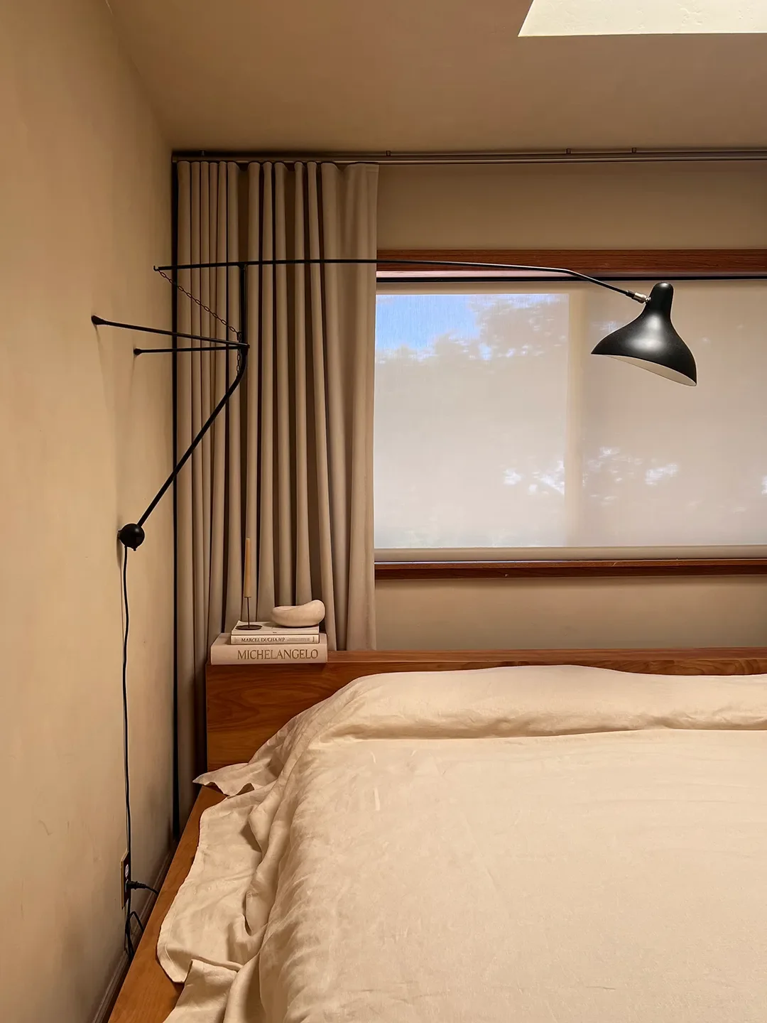 An L.A. Editor’s Wall-to-Wall Bed Frame Nearly Spans Her Narrow Bedroom—Why the Bold Move Pays Off