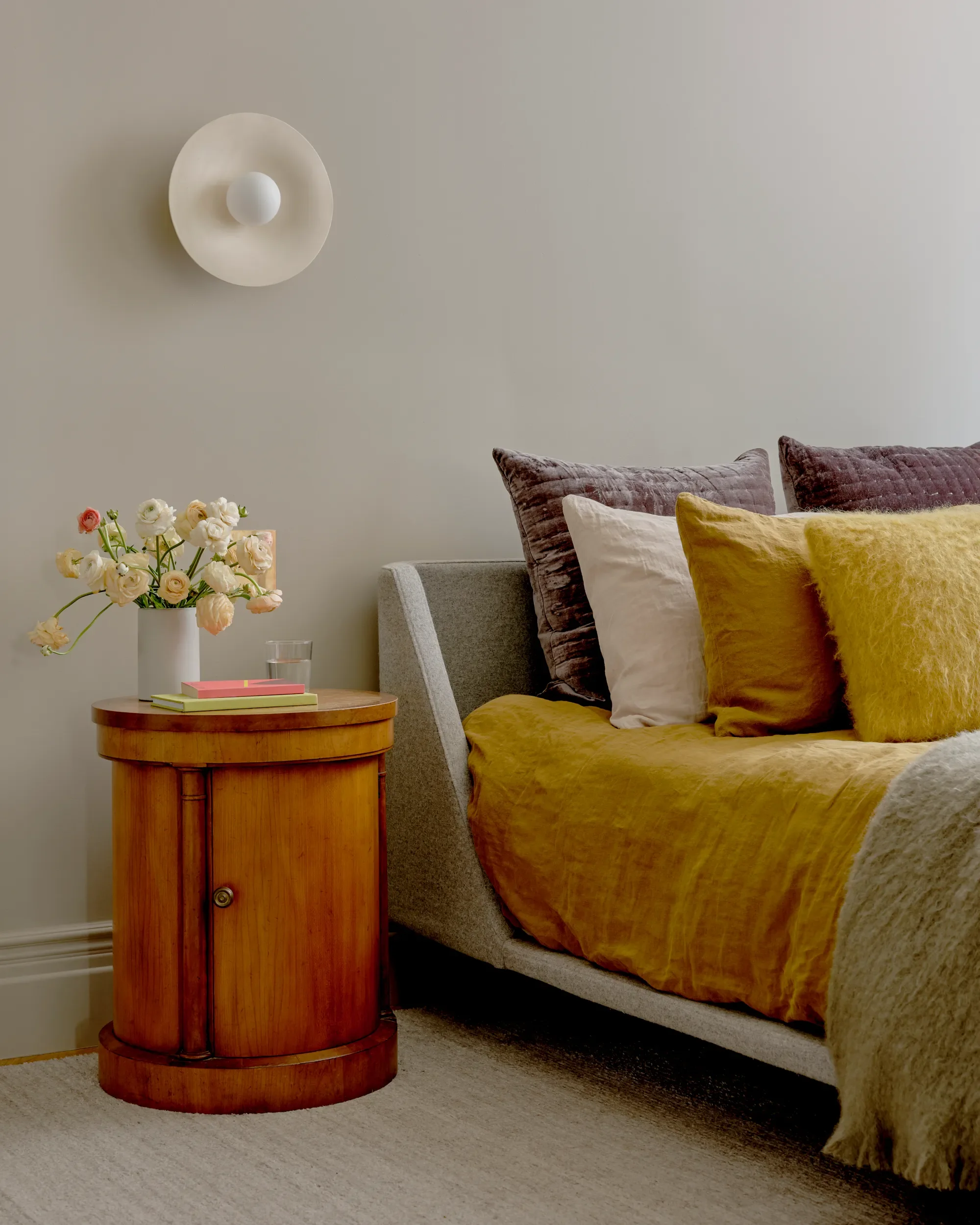 Why I Traded Under-Bed Storage for a Low, Upholstered Frame
