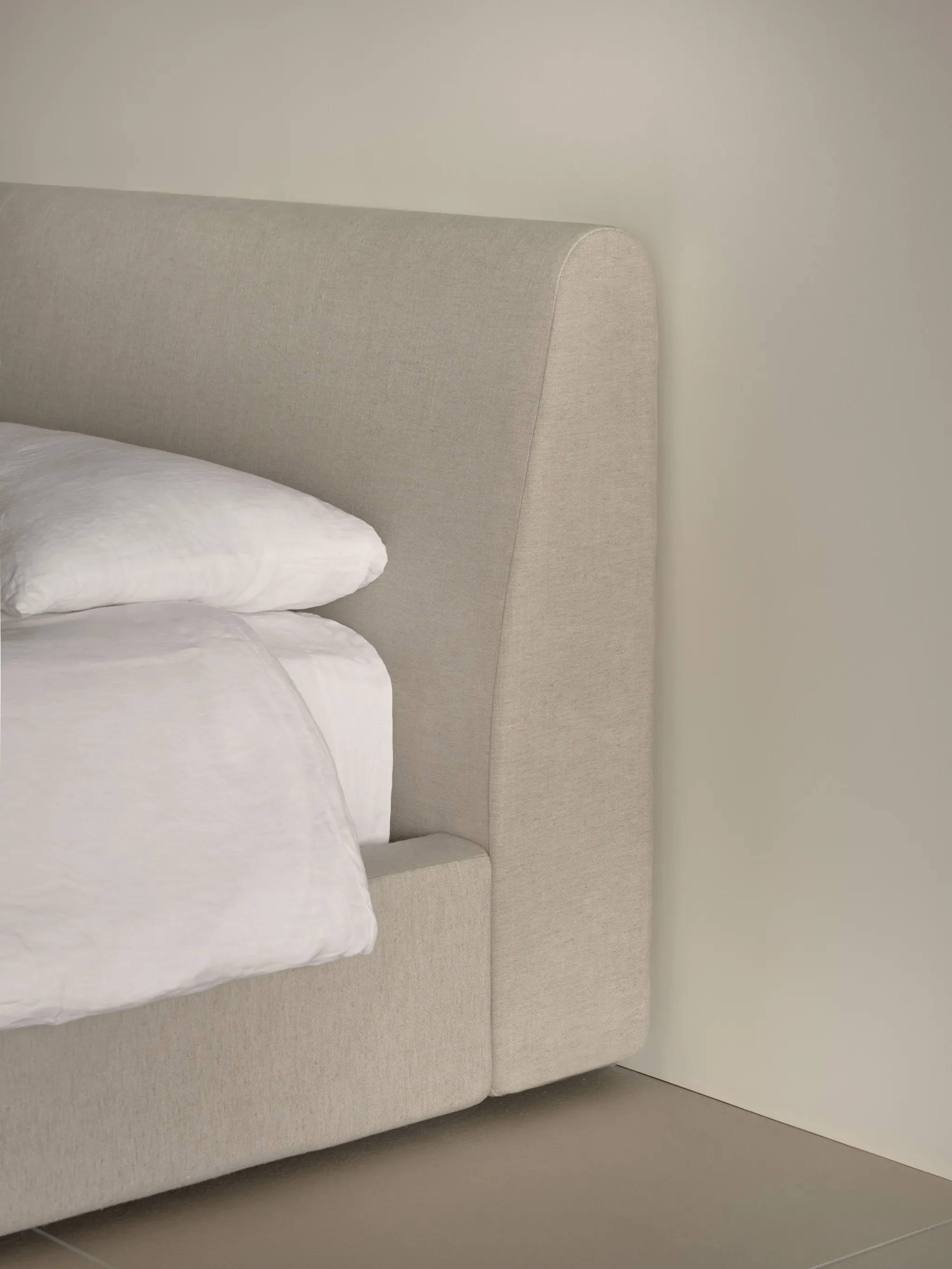 Why I Traded Under-Bed Storage for a Low, Upholstered Frame